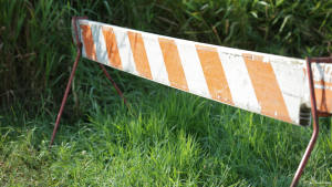 wooden barricade in grass