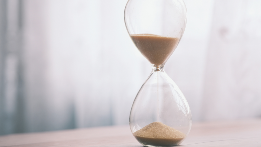 hourglass filling with sand
